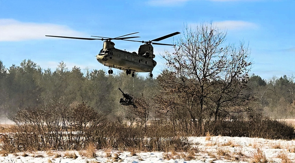 120th Field Artillery Soldiers conduct winter sling-load ops with Black Hawk, Chinook helicopters
