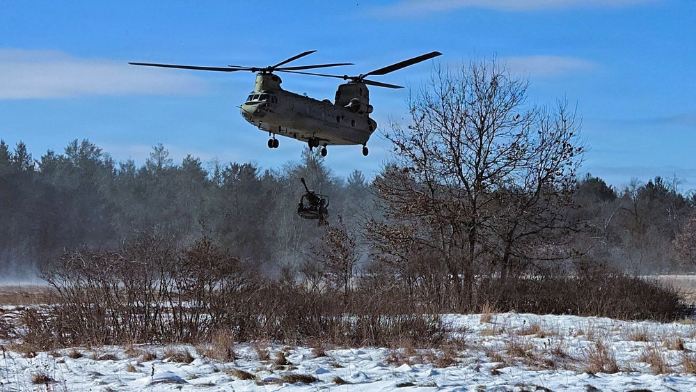 120th Field Artillery Soldiers conduct winter sling-load ops with Black Hawk, Chinook helicopters
