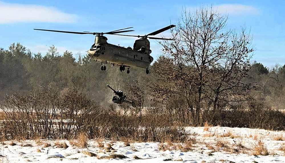 120th Field Artillery Soldiers conduct winter sling-load ops with Black Hawk, Chinook helicopters