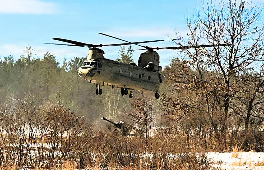 120th Field Artillery Soldiers conduct winter sling-load ops with Black Hawk, Chinook helicopters