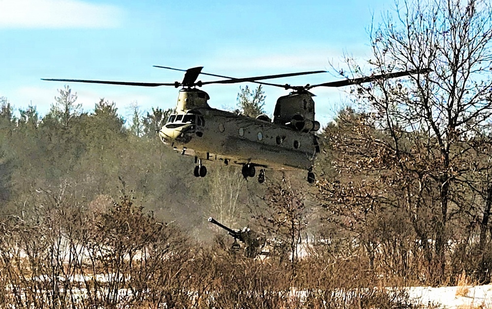 120th Field Artillery Soldiers conduct winter sling-load ops with Black Hawk, Chinook helicopters