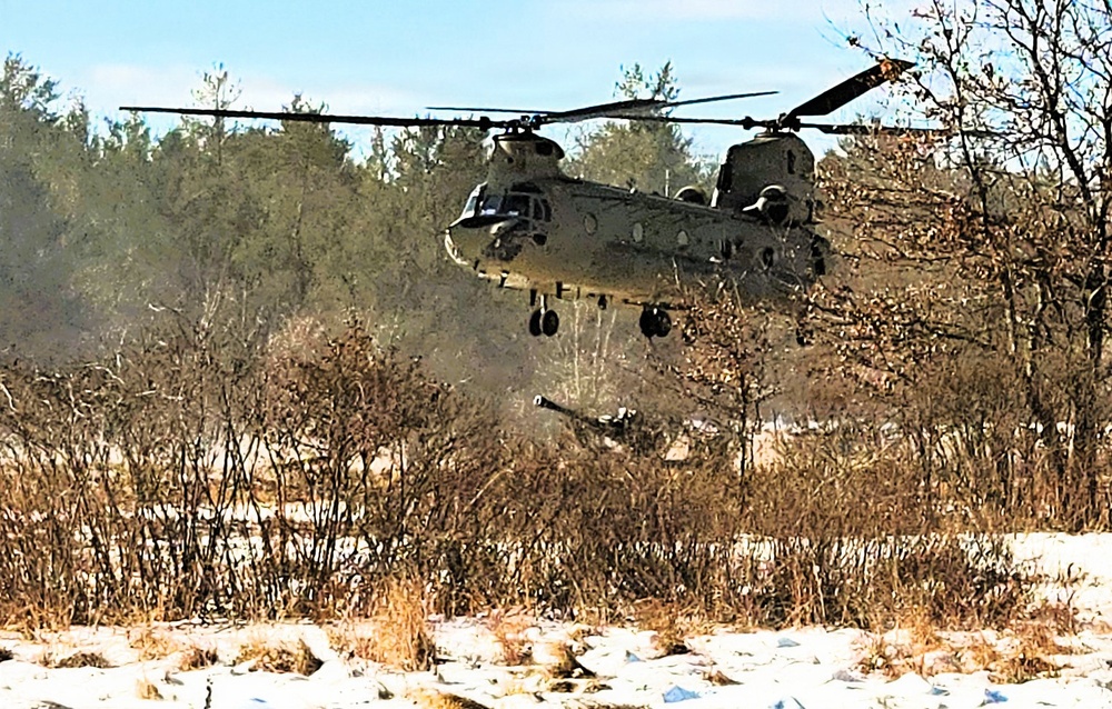 120th Field Artillery Soldiers conduct winter sling-load ops with Black Hawk, Chinook helicopters