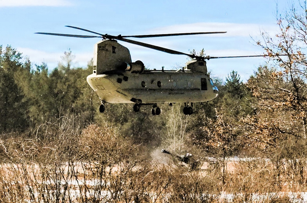 120th Field Artillery Soldiers conduct winter sling-load ops with Black Hawk, Chinook helicopters