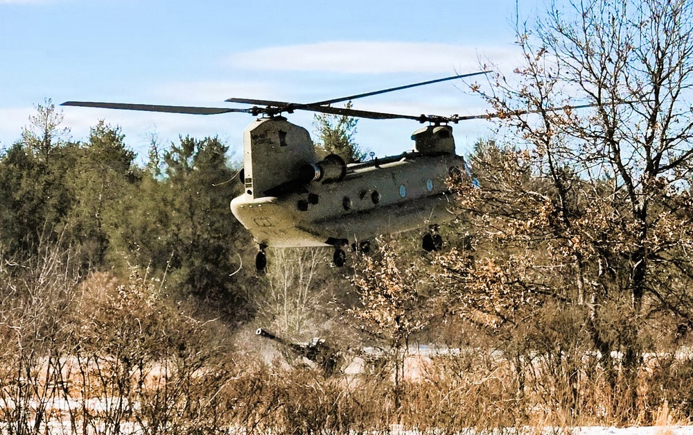 120th Field Artillery Soldiers conduct winter sling-load ops with Black Hawk, Chinook helicopters