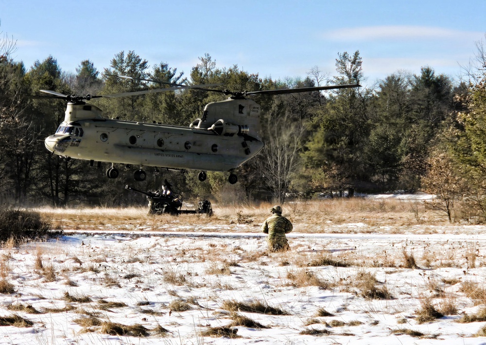 120th Field Artillery Soldiers conduct winter sling-load ops with Black Hawk, Chinook helicopters