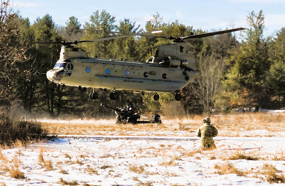 120th Field Artillery Soldiers conduct winter sling-load ops with Black Hawk, Chinook helicopters