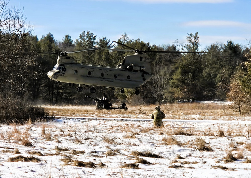 120th Field Artillery Soldiers conduct winter sling-load ops with Black Hawk, Chinook helicopters