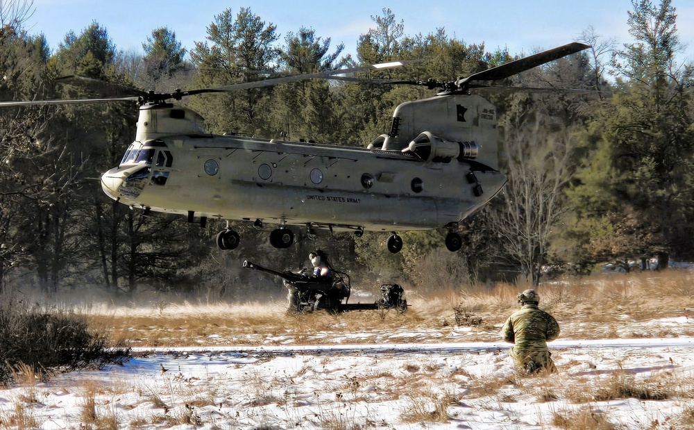120th Field Artillery Soldiers conduct winter sling-load ops with Black Hawk, Chinook helicopters