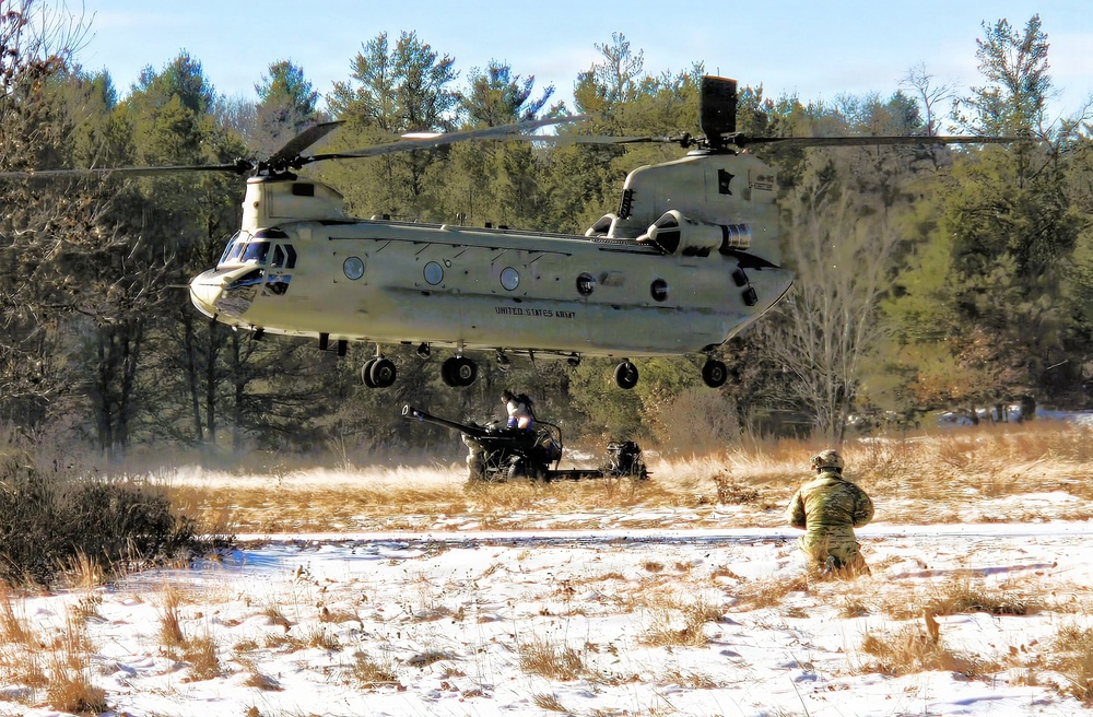 120th Field Artillery Soldiers conduct winter sling-load ops with Black Hawk, Chinook helicopters