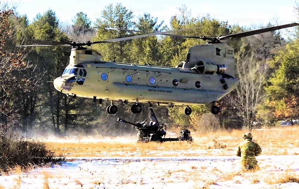 120th Field Artillery Soldiers conduct winter sling-load ops with Black Hawk, Chinook helicopters
