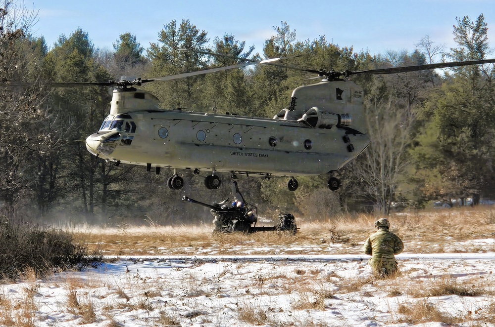 120th Field Artillery Soldiers conduct winter sling-load ops with Black Hawk, Chinook helicopters