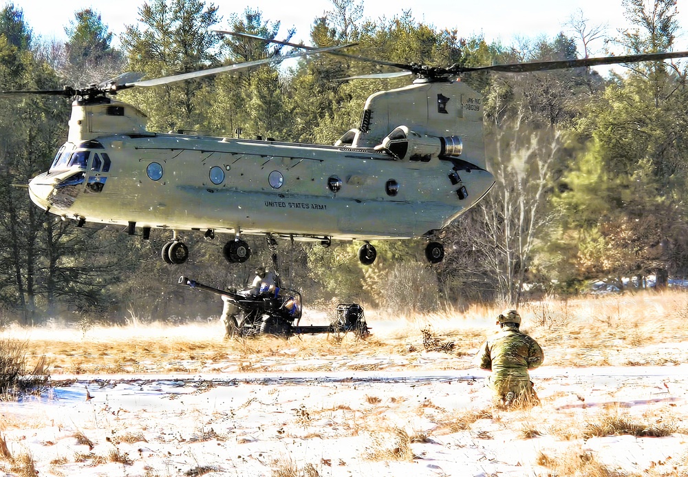 120th Field Artillery Soldiers conduct winter sling-load ops with Black Hawk, Chinook helicopters