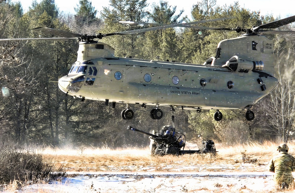 120th Field Artillery Soldiers conduct winter sling-load ops with Black Hawk, Chinook helicopters