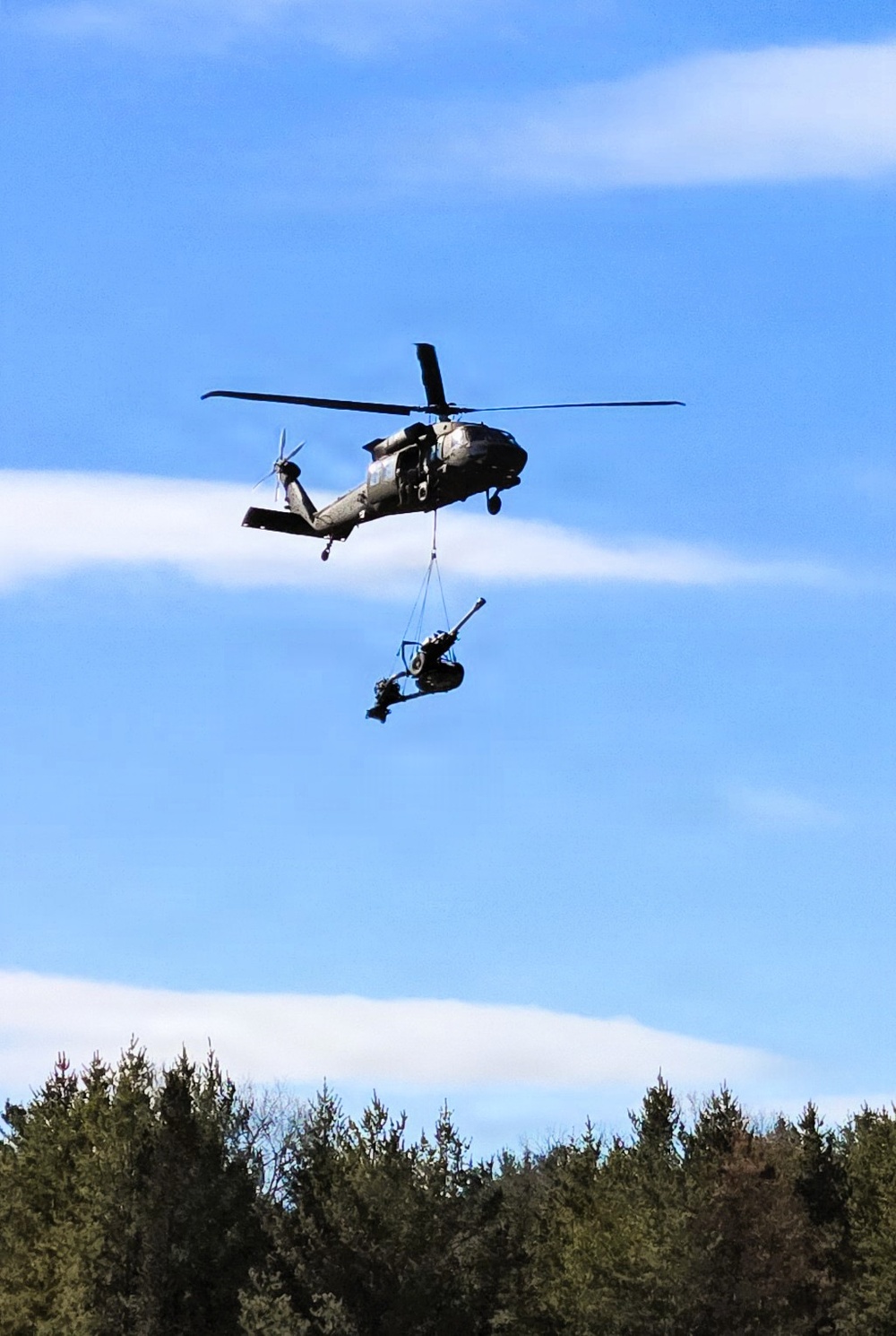 120th Field Artillery Soldiers conduct winter sling-load ops with Black Hawk, Chinook helicopters