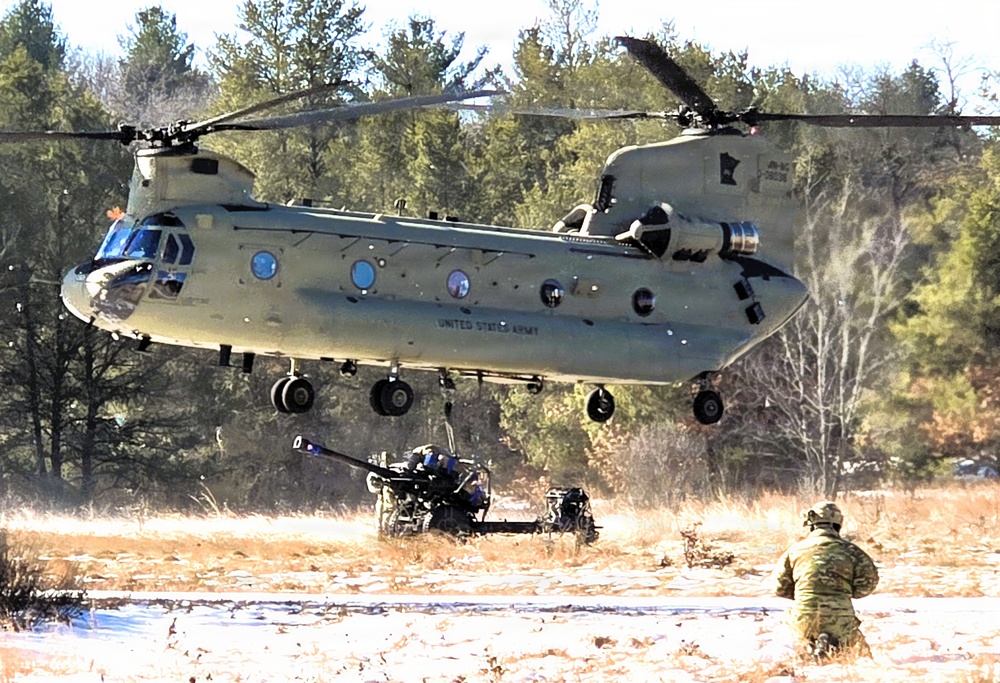 120th Field Artillery Soldiers conduct winter sling-load ops with Black Hawk, Chinook helicopters