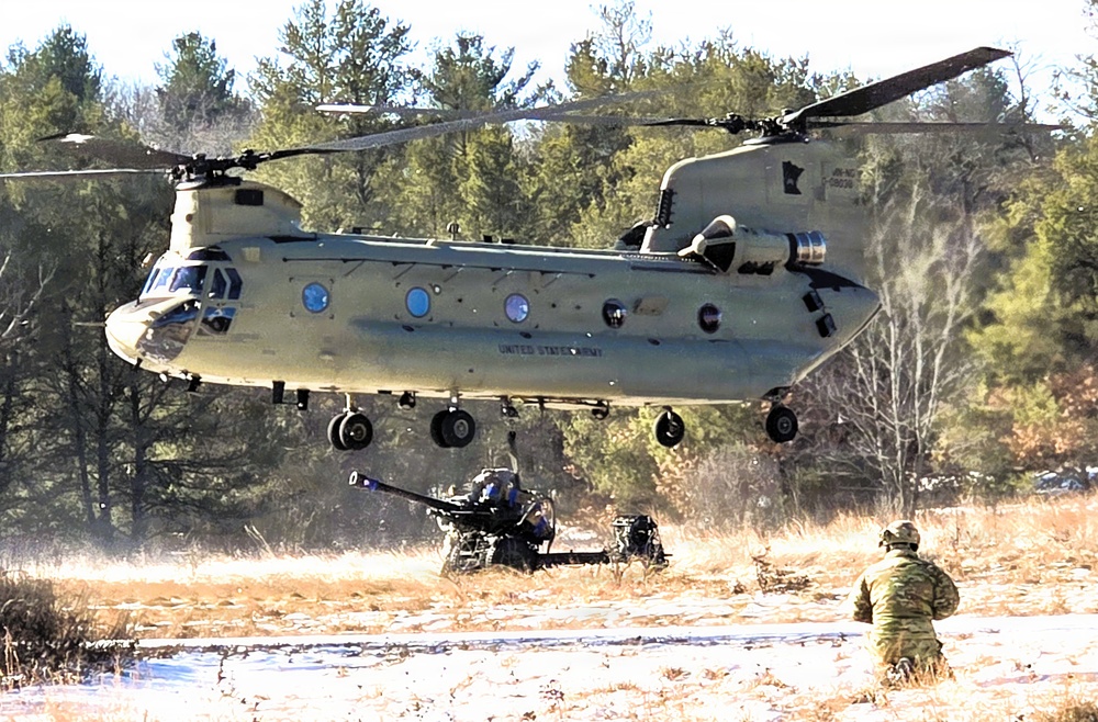 120th Field Artillery Soldiers conduct winter sling-load ops with Black Hawk, Chinook helicopters