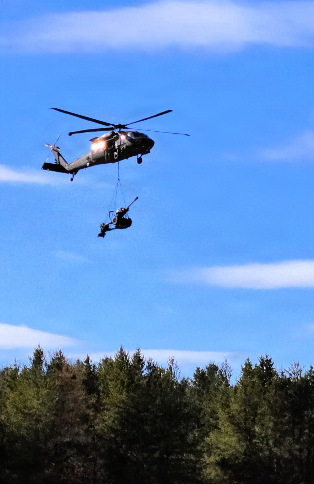 120th Field Artillery Soldiers conduct winter sling-load ops with Black Hawk, Chinook helicopters