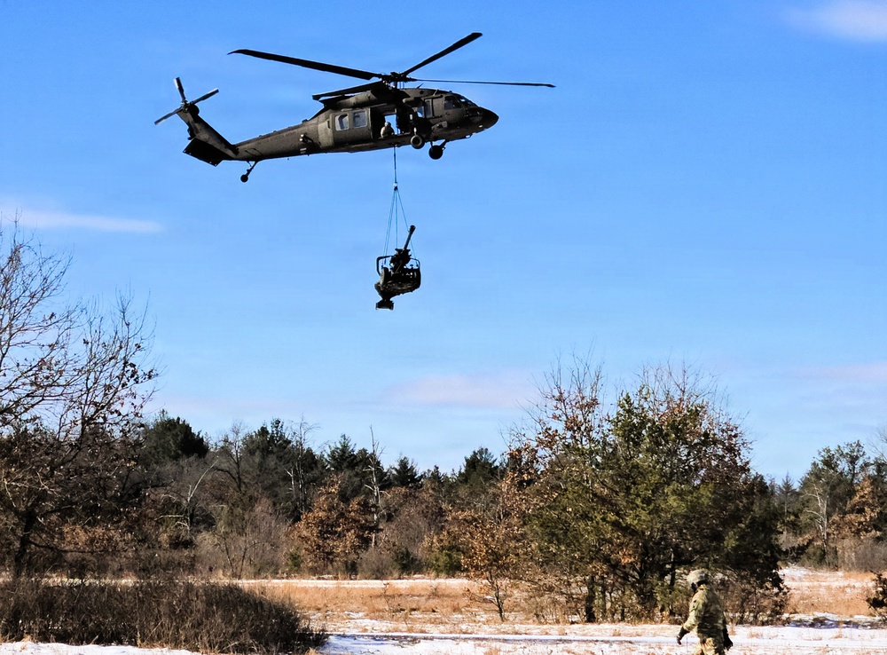 120th Field Artillery Soldiers conduct winter sling-load ops with Black Hawk, Chinook helicopters