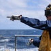 Sailors aboard the USS John Finn conduct a crash and salvage drill in the South China Sea