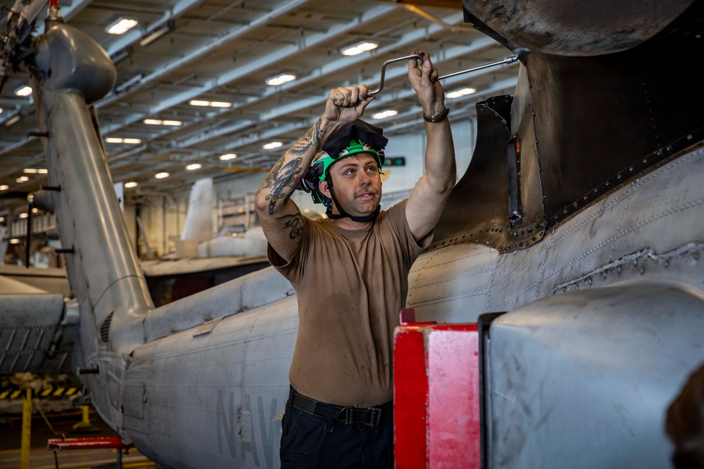 Abraham Lincoln conducts routine maintenance