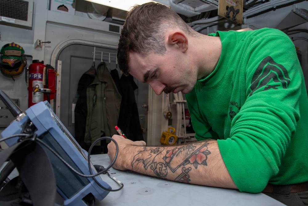 Abraham Lincoln conducts routine maintenance