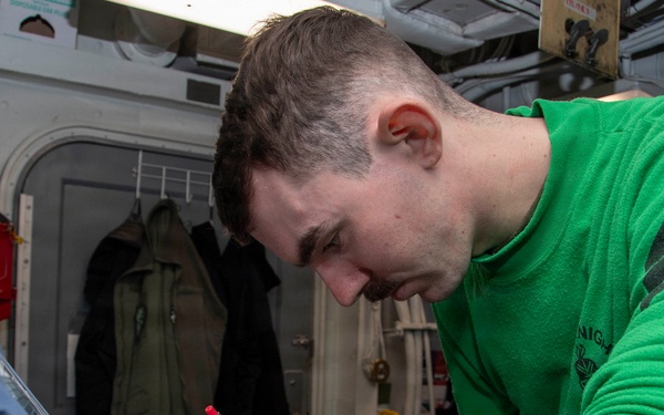 Abraham Lincoln conducts routine maintenance