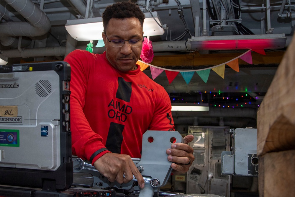 Abraham Lincoln conducts routine maintenance