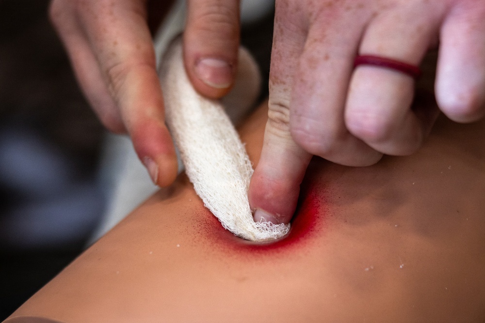 11th MEU Marines Conduct Tactical Combat Casualty Care Training Aboard USS Comstock