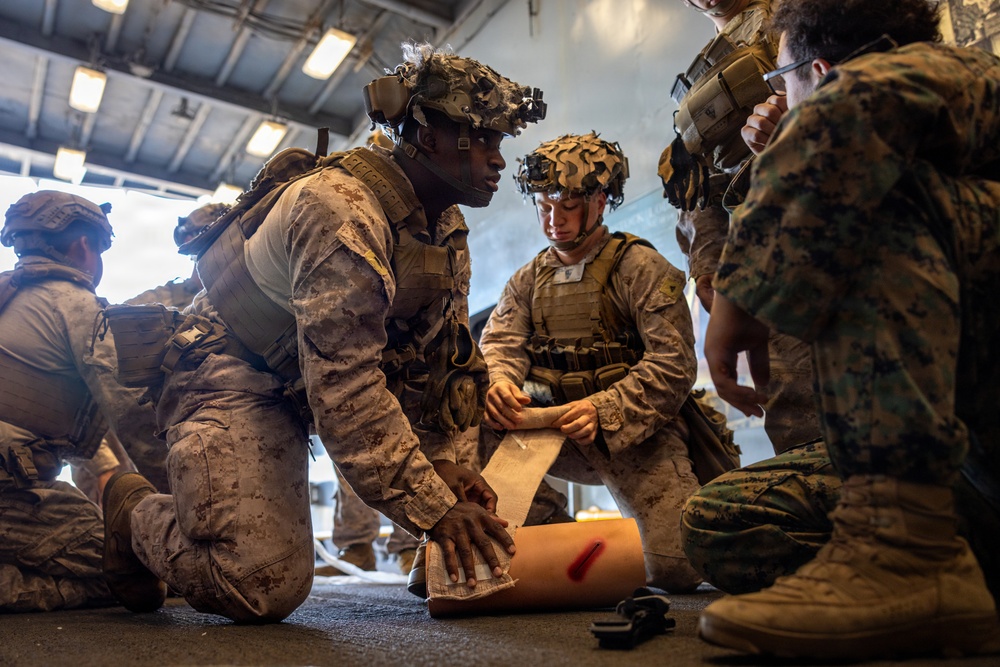 11th MEU Marines Conduct Tactical Combat Casualty Care Training Aboard USS Comstock