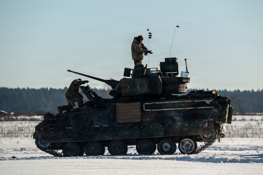 3-8 Cavalry conducts Bradley live fire training in Poland during sub zero temperatures