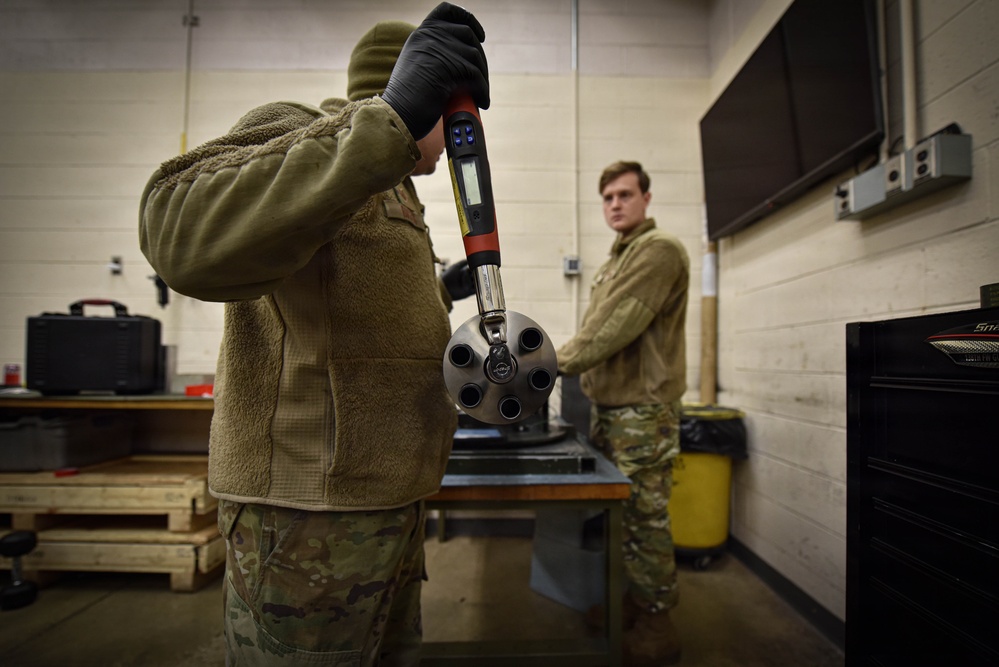 138th Aircraft Maintenance Squadron Airmen inspect F-16 Viper weaponry
