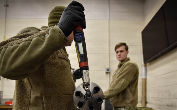 138th Aircraft Maintenance Squadron Airmen inspect F-16 Viper weaponry