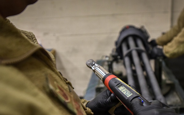 138th Aircraft Maintenance Squadron Airmen inspect F-16 Viper weaponry
