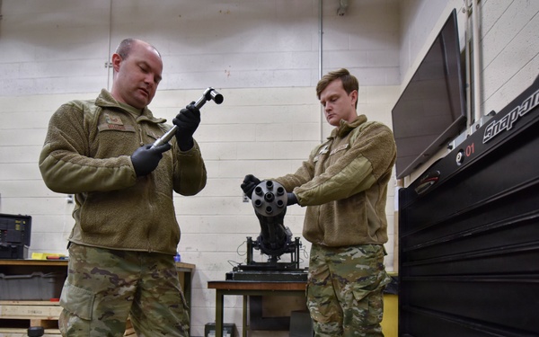 138th Aircraft Maintenance Squadron Airmen inspect F-16 Viper weaponry