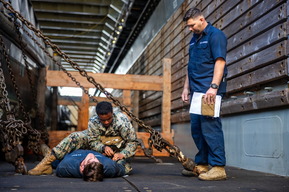 11th MEU Marines Conduct Combat Life Saver Qualification Aboard USS Comstock