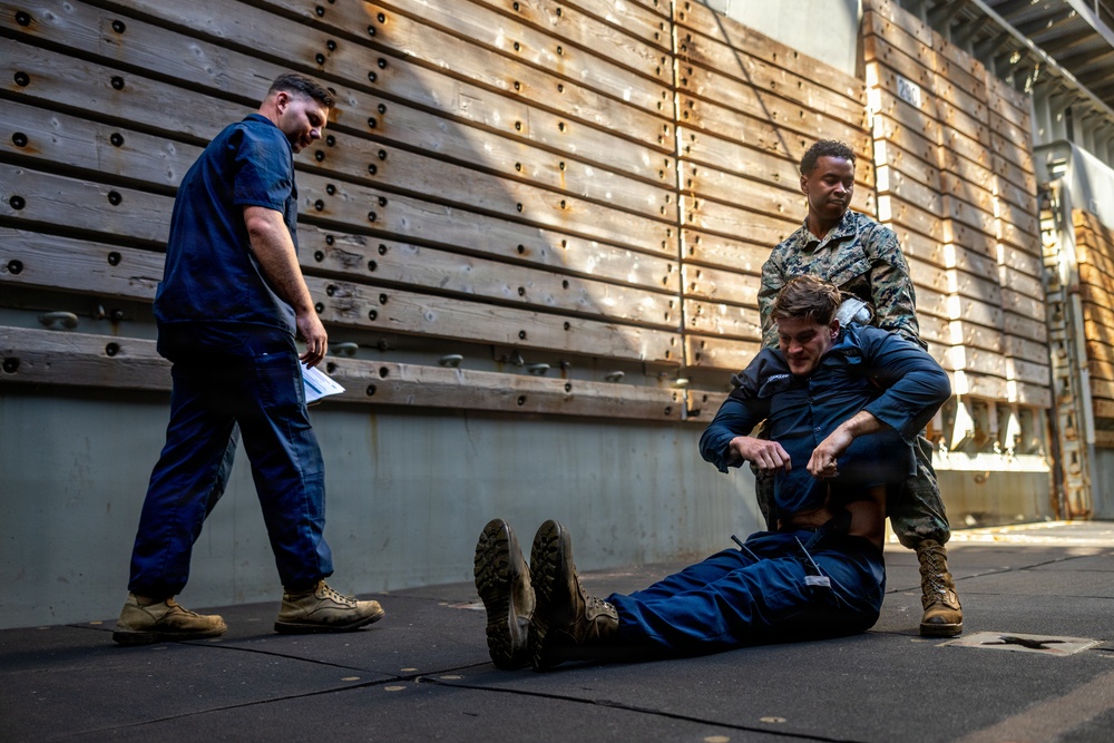 11th MEU Marines Conduct Combat Life Saver Qualification Aboard USS Comstock