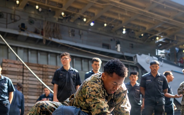11th MEU Marines Conduct Combat Life Saver Qualification Aboard USS Comstock