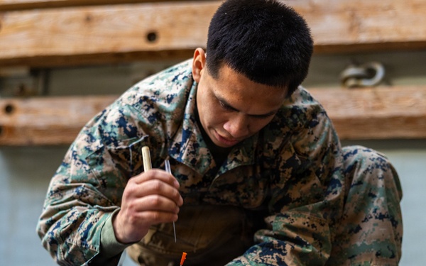11th MEU Marines Conduct Combat Life Saver Qualification Aboard USS Comstock