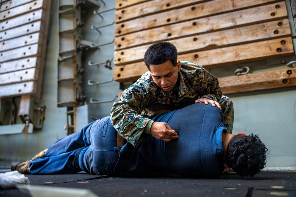 11th MEU Marines Conduct Combat Life Saver Qualification Aboard USS Comstock