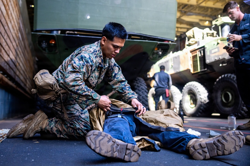 11th MEU Marines Conduct Combat Life Saver Qualification Aboard USS Comstock