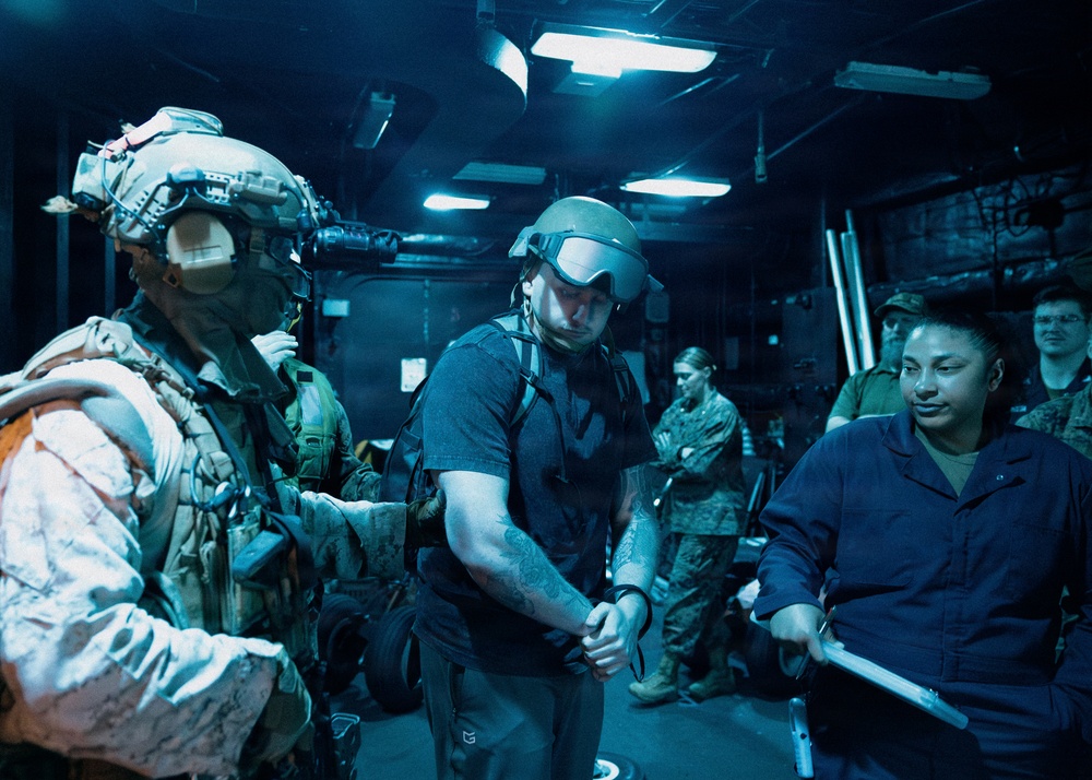 11th MEU Marines, Sailors Conduct Night VBSS Exercise