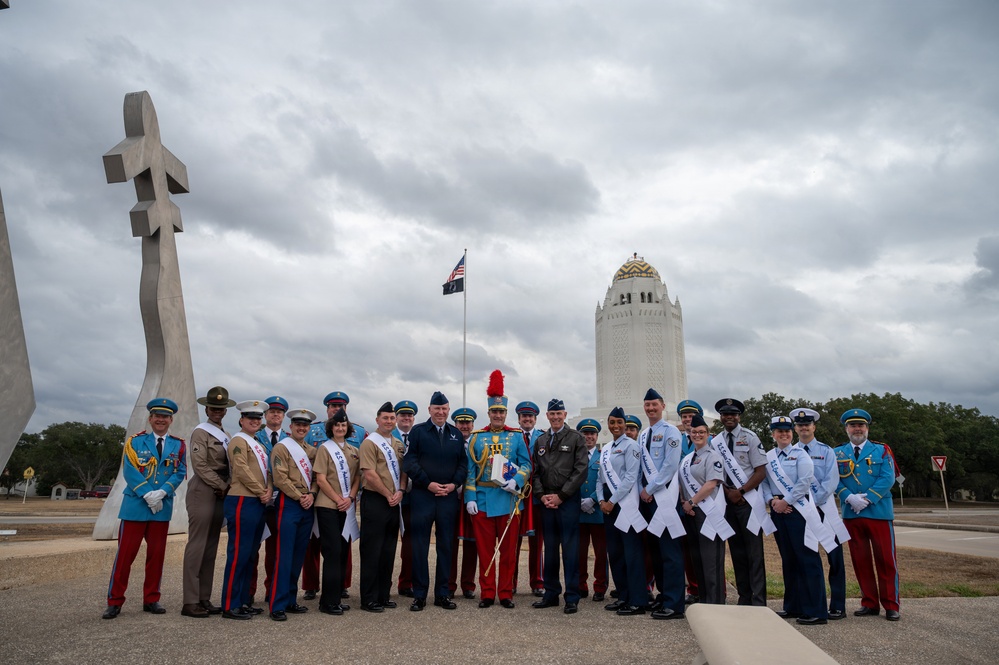 Texas Cavaliers and San Antonio Fiesta Military Ambassadors  gift AETC with river parade tickets