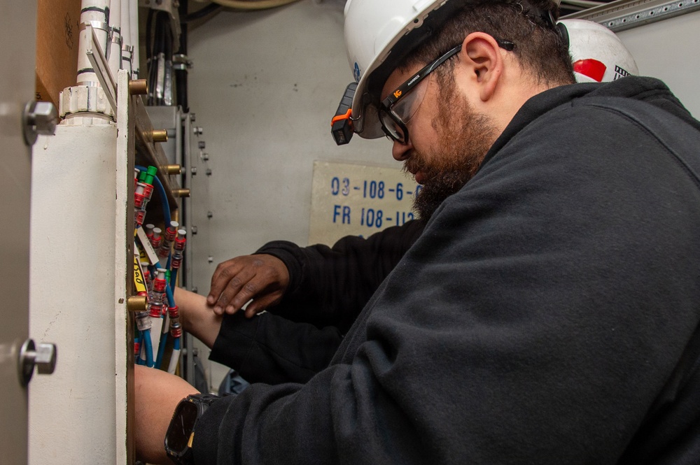 Ronald Reagan Sailors and Contractors Execute Maintenance Operations