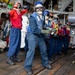 USS Gettysburg (CG-64) Sailors Step Into The Hangar Bay