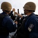 U.S. Sailors Reload an M240B Machine Gun