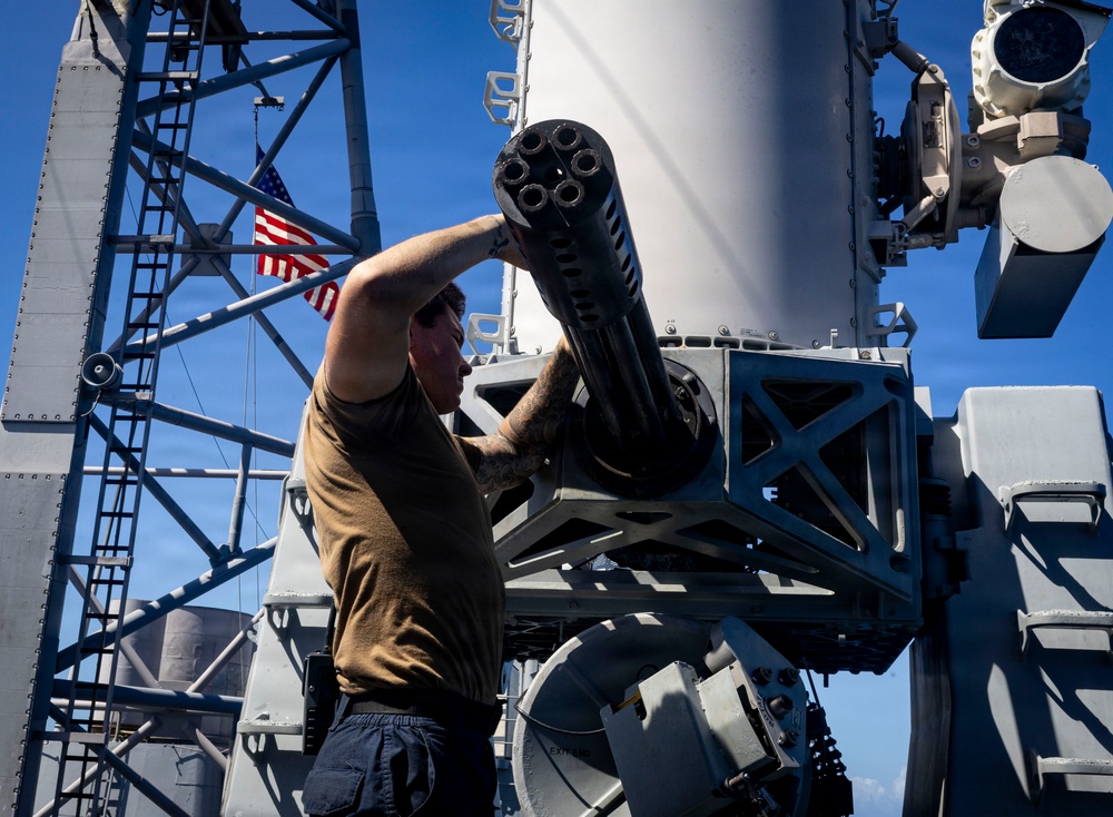 U.S. Sailor Conducts Maintenance on a Close-in Weapons System