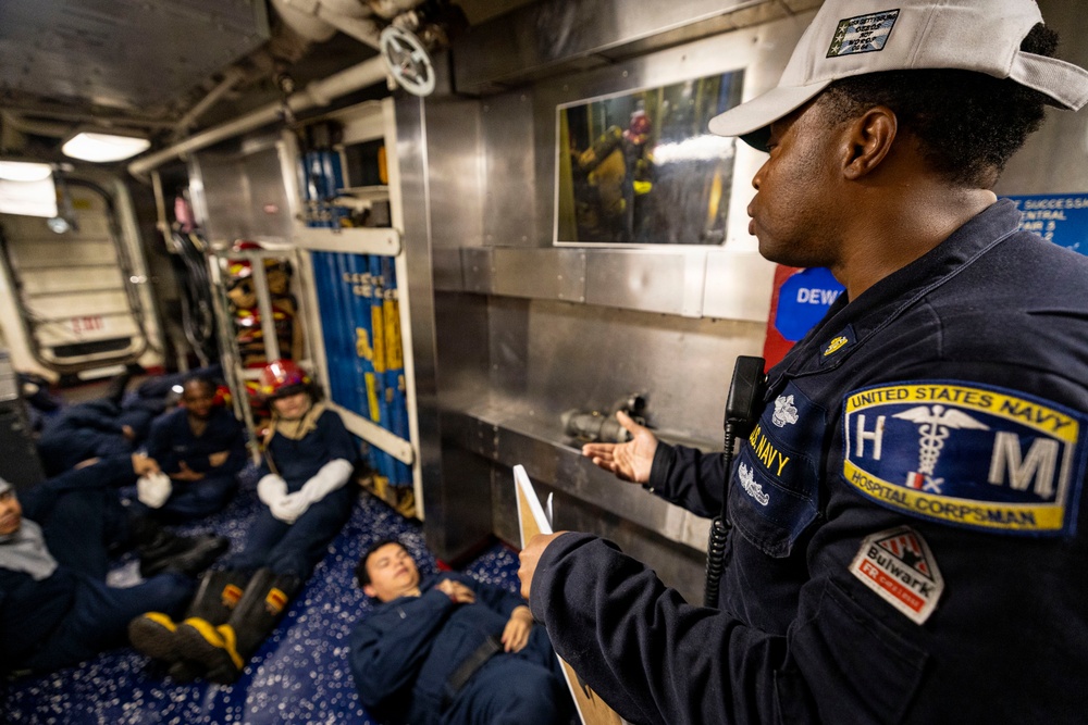 U.S. Sailor Instructs Sailors During a Damage Control Training Evolution