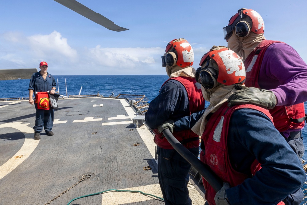 U.S. Sailors man a Firefighting Hose on the Flight Deck During a Damage Control Training Evolution