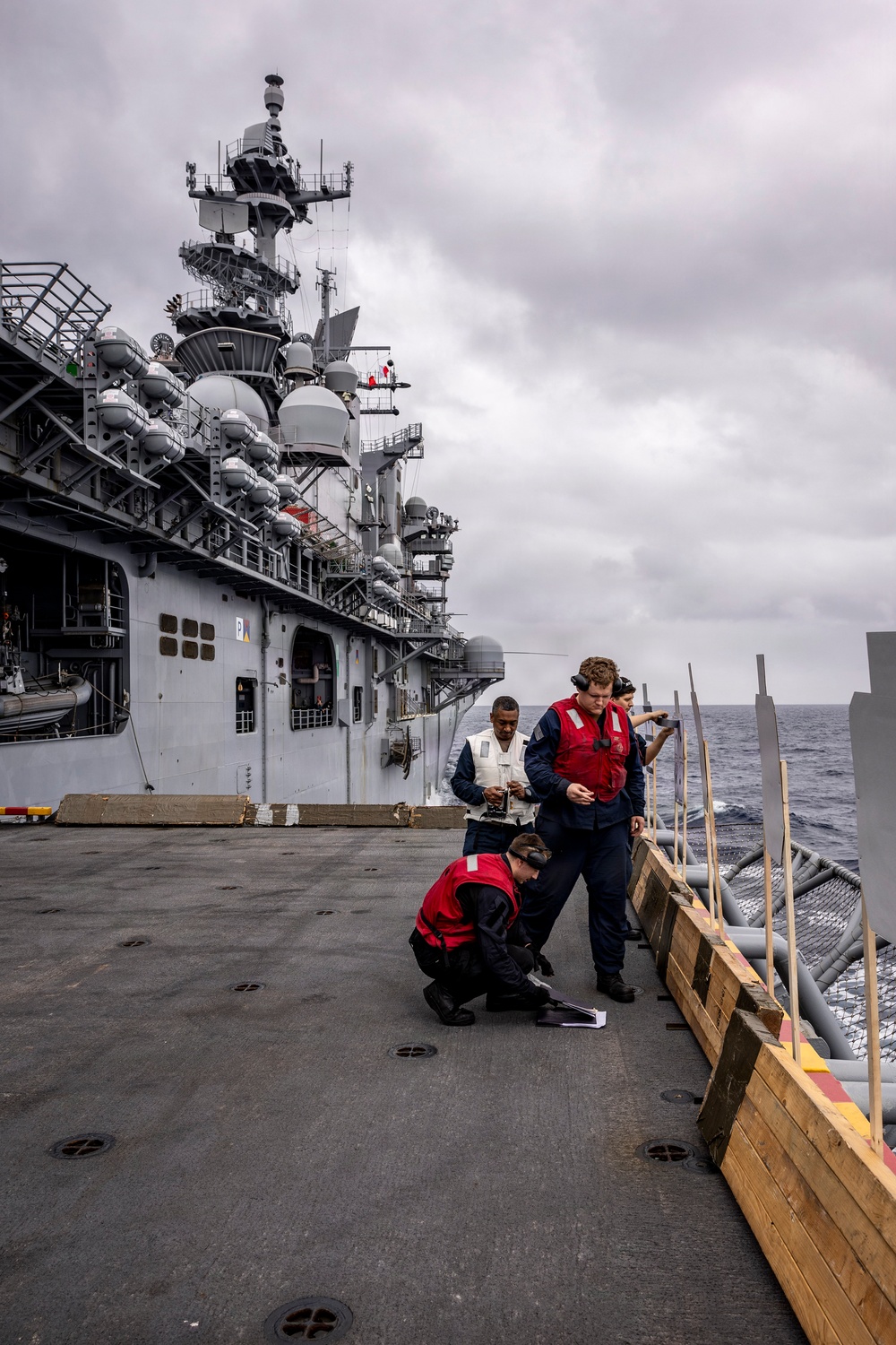 USS Iwo Jima Sailors Conduct a Live Fire Exercise