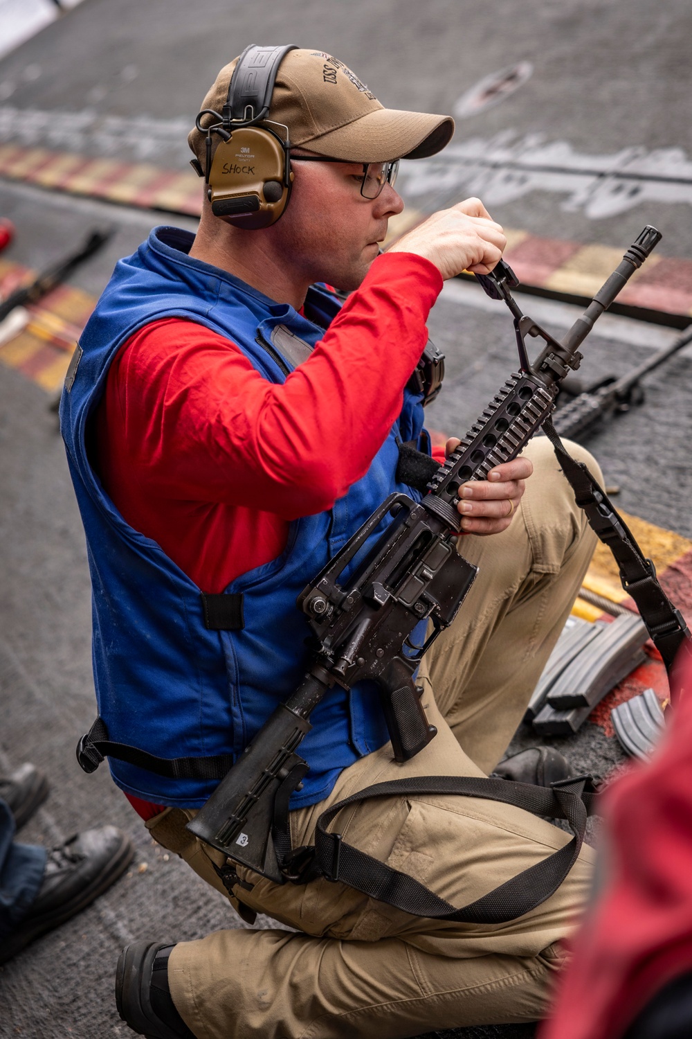USS Iwo Jima Sailors Conduct a Live Fire Exercise